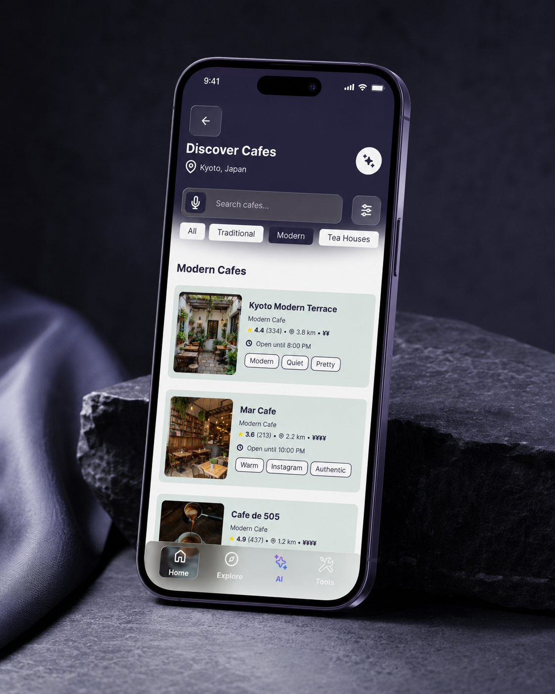 WanderWise Discover Cafes screen showing modern café listings in Kyoto